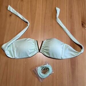 Victoria’s Secret, size Small: mint green strapless bikini top with gold V front